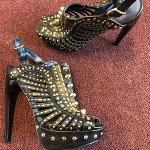Studded leather platform horned heels